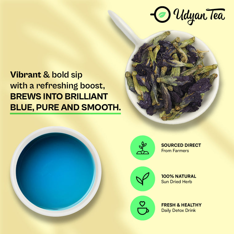 Dried blue pea flowers and a cup of brewed blue tea