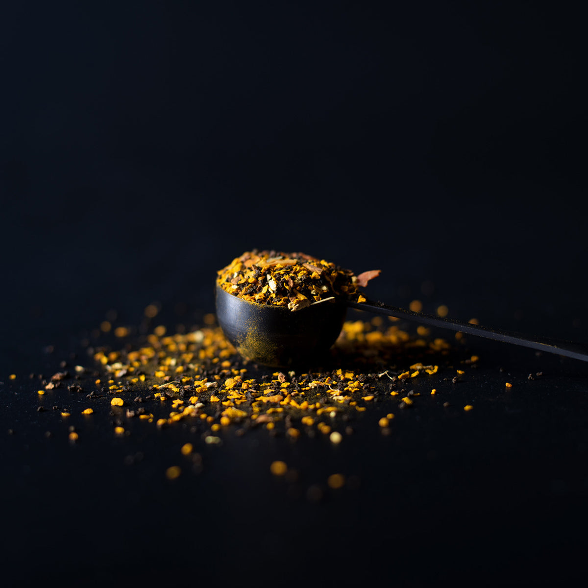Ideal tea spoon filled with loose-leaf tea