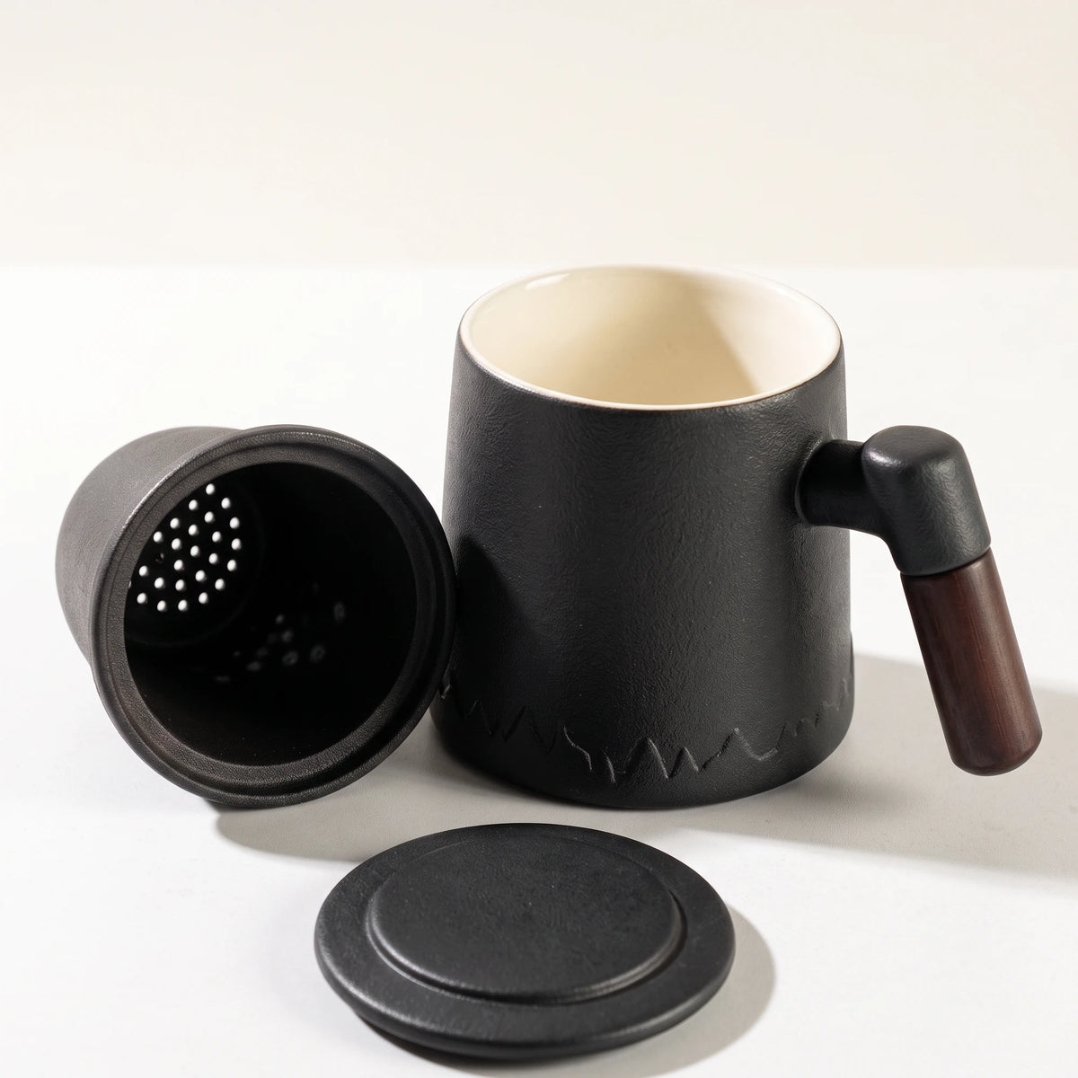 Everest ceramic tea infuser mug, Noir Black, with infuser and lid removed