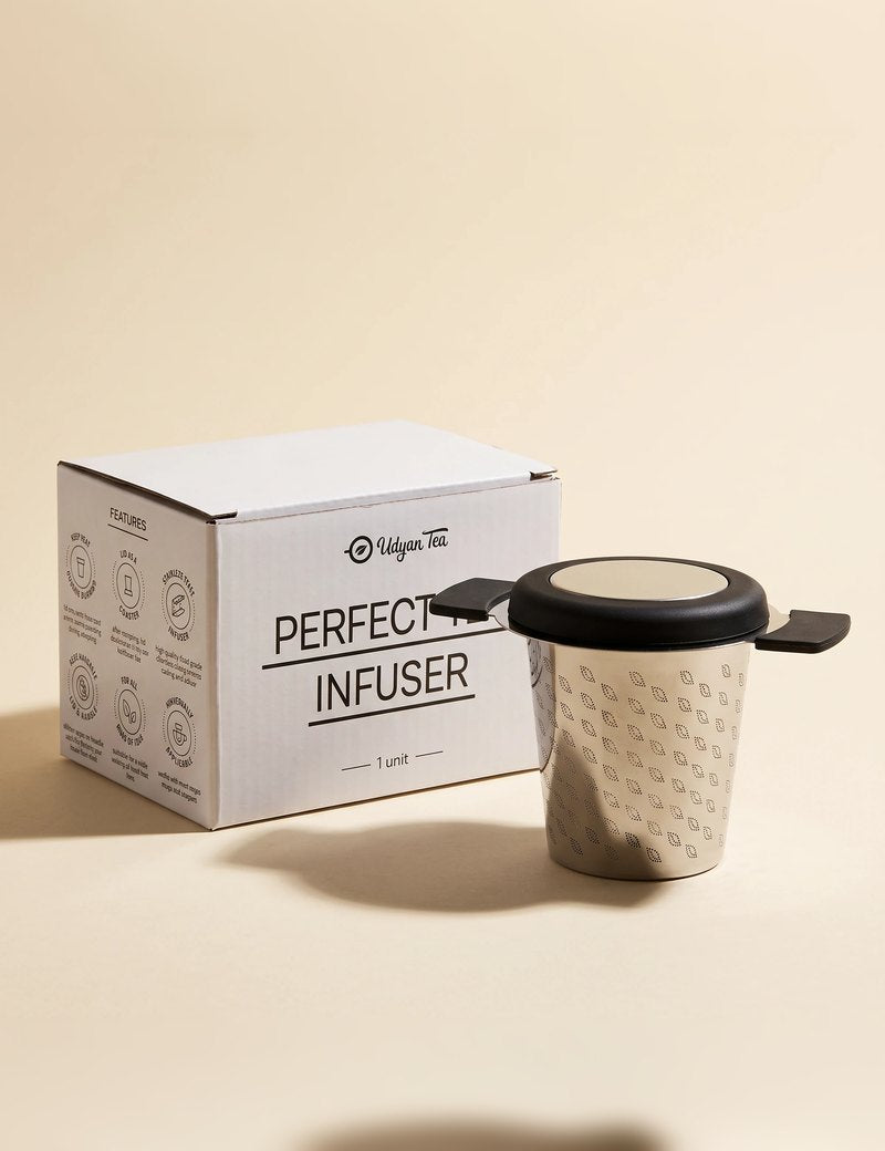 Perfect tea infuser next to its box