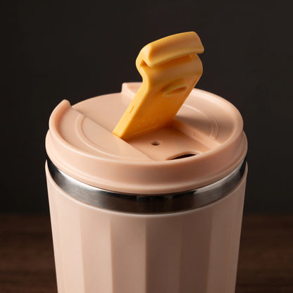Opal travel tumbler, Blush Pink, close-up of the flip lid