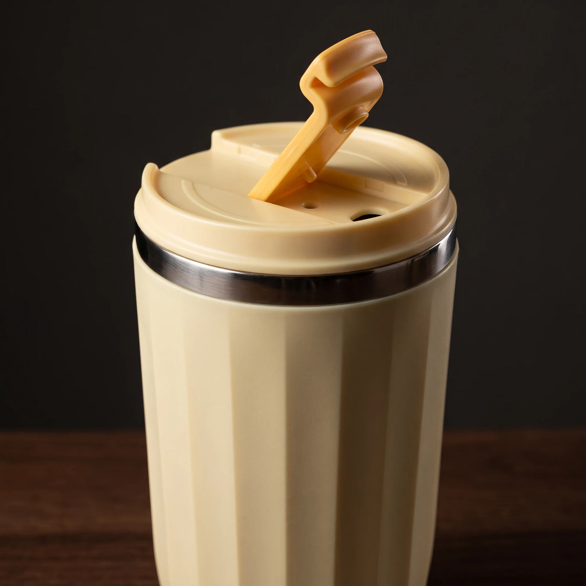 Opal travel tumbler, Honey Yellow, close-up of the flip lid