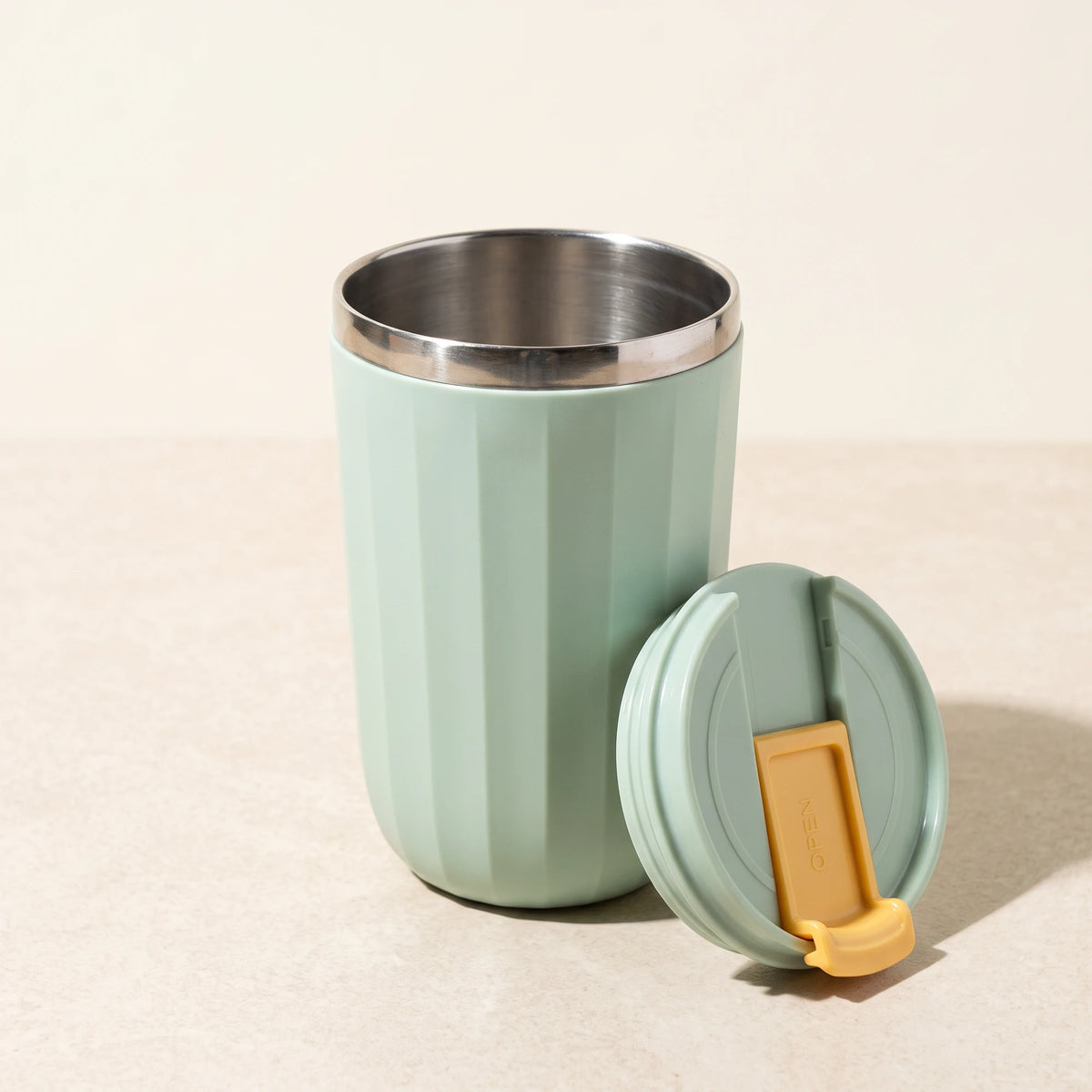 Opal travel tumbler, Sage Green, lid off, stainless steel inside