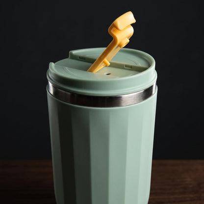 Opal travel tumbler, Sage Green, close-up of the flip lid