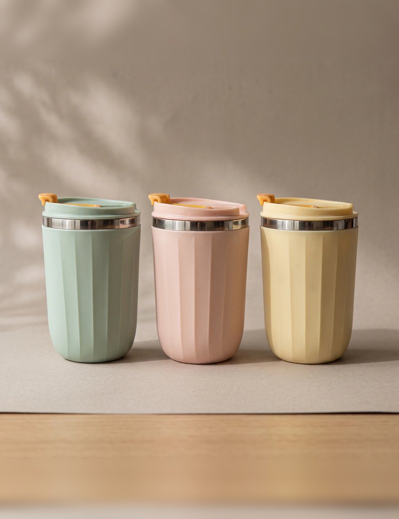 Opal travel tumblers in Sage Green, Blush Pink and Honey Yellow, side by side