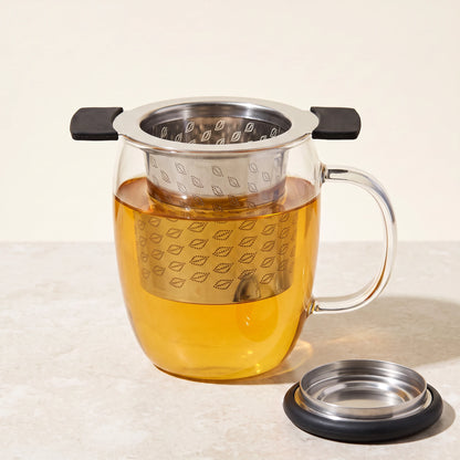 Perfect tea infuser, resting in a glass mug of tea