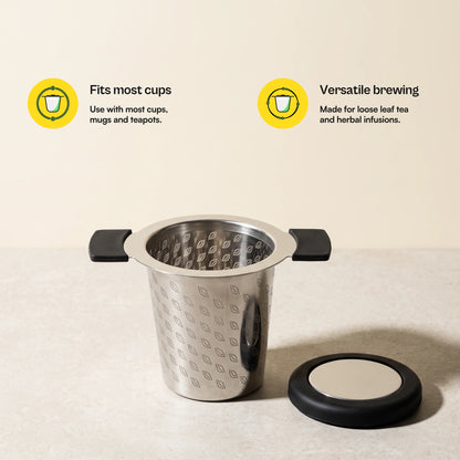 Perfect tea infuser, with lid beside it, with more feature callouts
